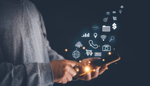 Man using smartphone for multimedia application, data search, stock trading analysis, location search, phone, chat and email communication, financial information, mobile banking, 
image recording.